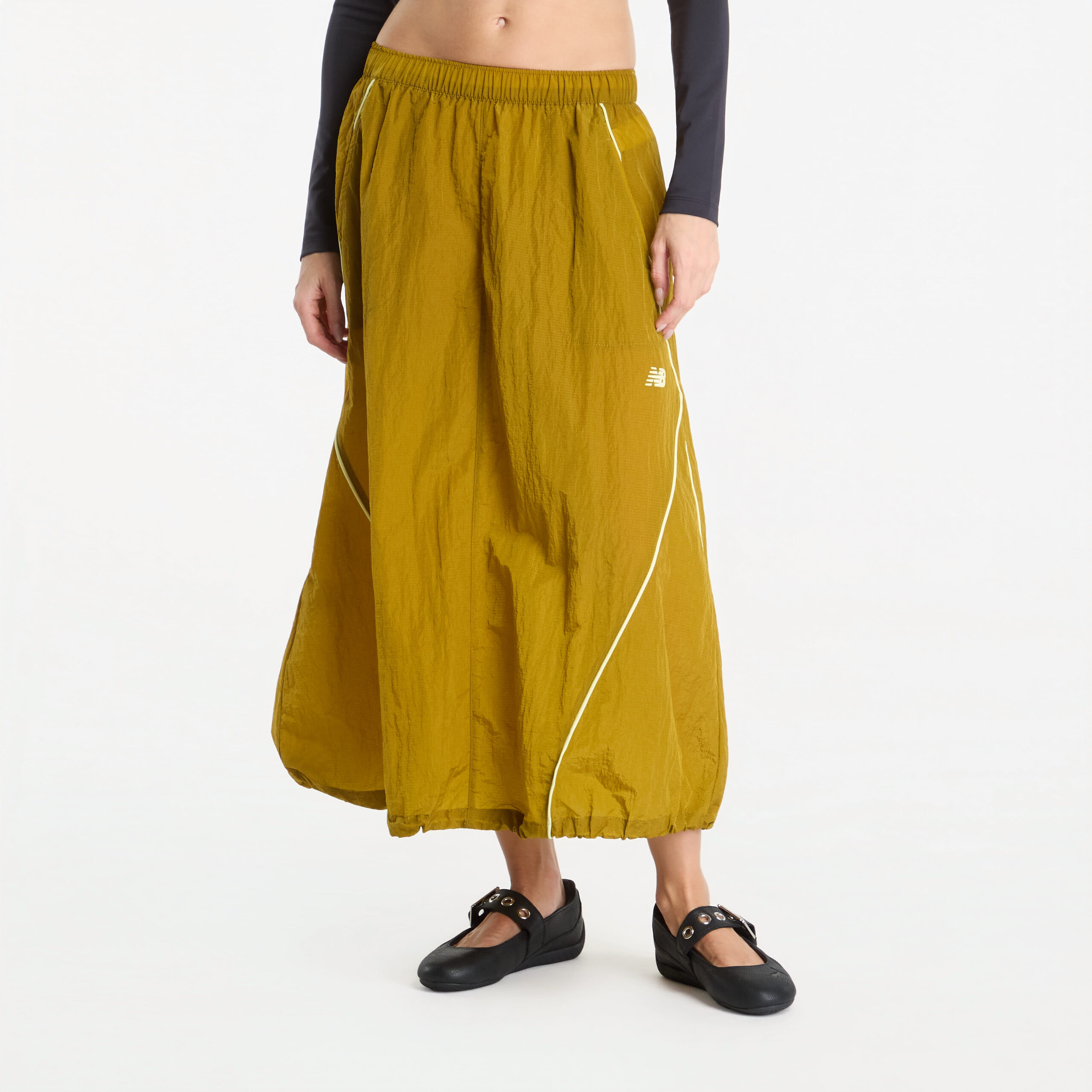 New Balance Sport Legacy Skirt Basil Oil L New Balance Sport Legacy Skirt Basil Oil L