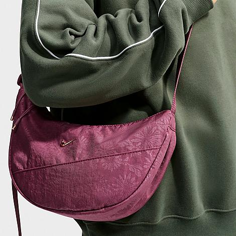 Nike Women’s Aura Floral Crescent Crossbody Bag in Pink Smoke/Pink Smoke/Rose Gold Nike Women’s Aura Floral Crescent Crossbody Bag in Pink Smoke/Pink Smoke/Rose Gold