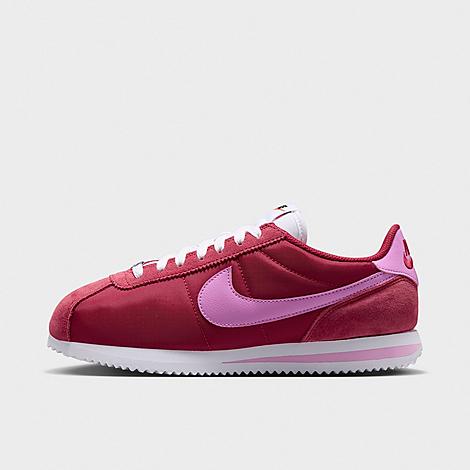 Nike Women’s Cortez Textile Casual Shoes in Tough Red/White/Safety Orange Size: 5.0 Nike Women’s Cortez Textile Casual Shoes in Tough Red/White/Safety Orange Size: 5.0